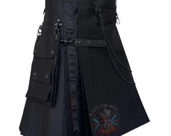 May include: A black utility kilt featuring multiple cargo pockets, metal D-rings, adjustable straps with snap closures, and a decorative chain. A circular patch with the text KILTS FOR MEN and a graphic of a kilt is visible on the lower front panel.