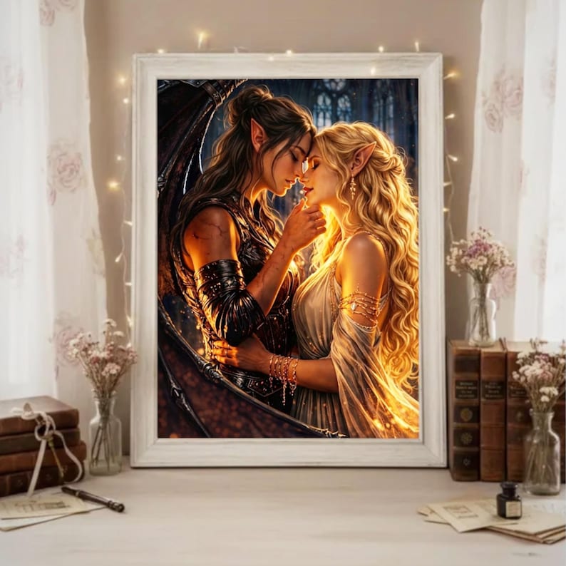 May include: A framed fantasy art print featuring two elven figures in an embrace. One figure has dark hair and wings, the other has blonde hair and a flowing gown. The artwork is set against a backdrop of a gothic cathedral.