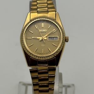 Seiko Gold-Tone Women\'s Bracelet Watch with Day-Date Seiko Watch Ladies Day/Date Quartz 2A23-0030 Gold Tone  main image 3