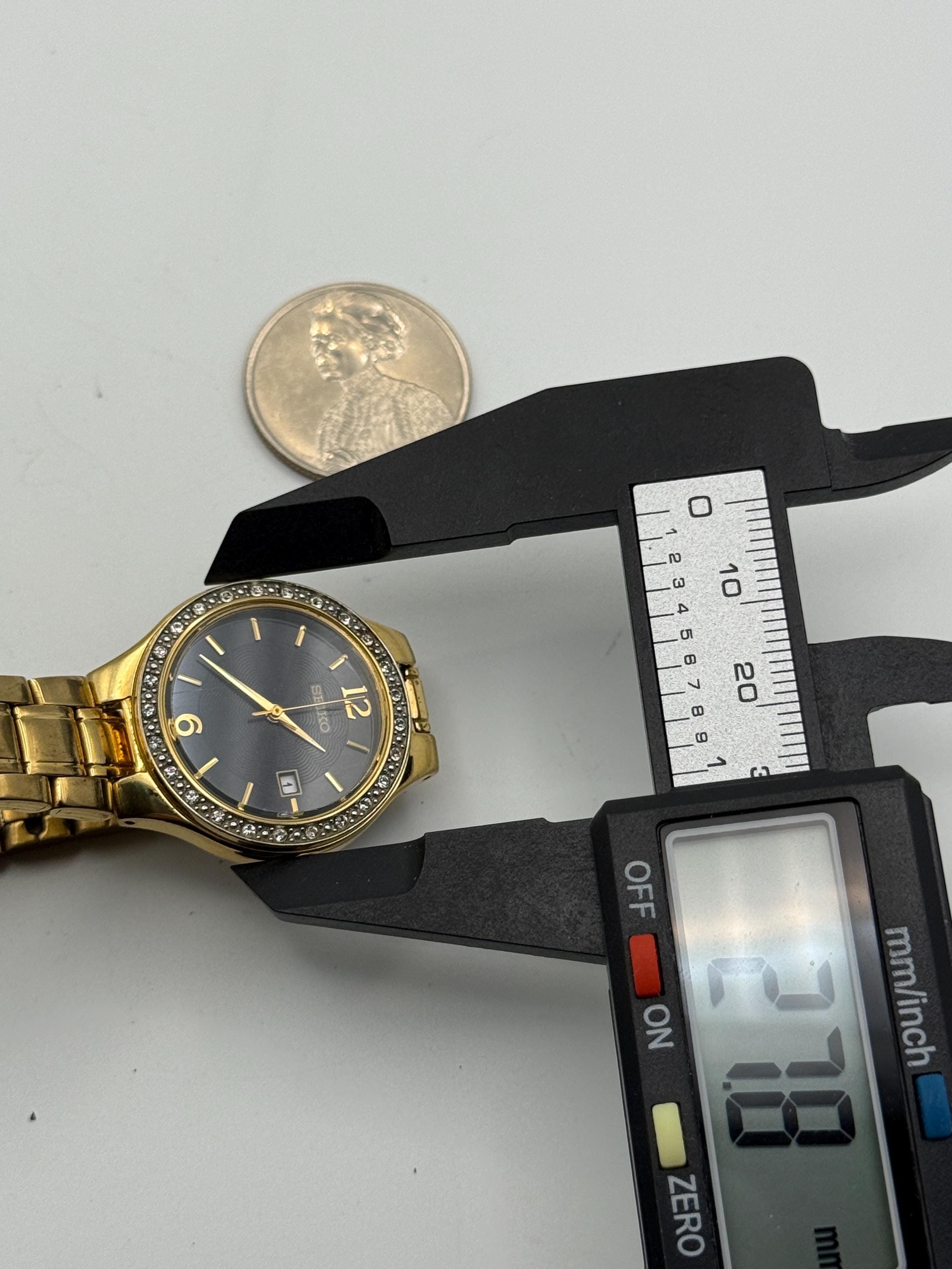 SEIKO vintage  手巻時計 ゴールド il_fullxfull.5279281118_4d0w.jpg