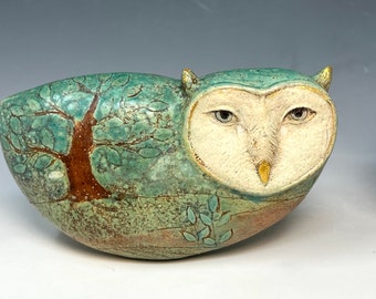 Green Owl with the landscape-sculpture by Margaret Wozniak