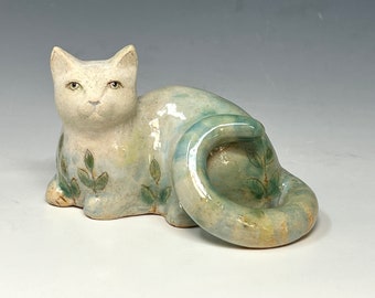 Reclining Cat with Flowers - sculpture by Margaret Wozniak