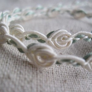 Pretty little IVORY rosette guimp trim