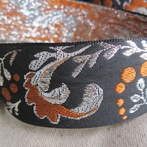 Adrea&#39;s Plume jacquard ribbon in BRONZE