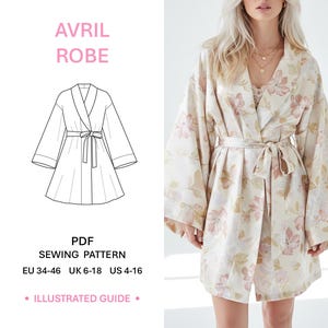 Op de afbeelding: Een badjas met bloemenprint en bijpassende riem, gedragen door een persoon. De badjas heeft wijde mouwen en een wikkelontwerp. De afbeelding bevat ook een lijntekening van de badjas en de tekst "AVRIL ROBE" en "PDF SEWING PATTERN".