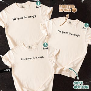 May include: Ivory-colored t-shirts with the phrase "his grace is enough" printed in three different fonts. The shirts are labeled as soft cotton and printed in the USA.