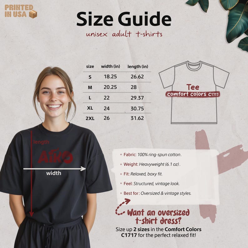 May include: A woman wearing a black t-shirt, with a size guide for unisex adult t-shirts. The guide lists sizes S to 2XL, with width and length measurements in inches. The shirt is heavyweight, made of ring-spun cotton, and has a relaxed fit.