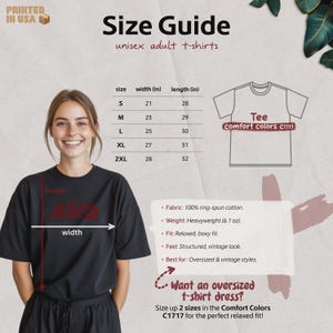 May include: A size guide for unisex adult t-shirts, with measurements in inches. The guide includes sizes S to 2XL, with corresponding width and length dimensions. Features include fabric, weight, fit, and style details. The text also suggests sizing up for an oversized fit.