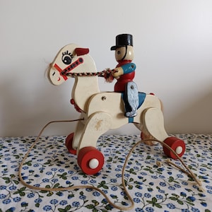 Vintage 1950s Painted Wooden Toy Soldier Riding Horse Pull Toy – Mid‑Century Retro Decor