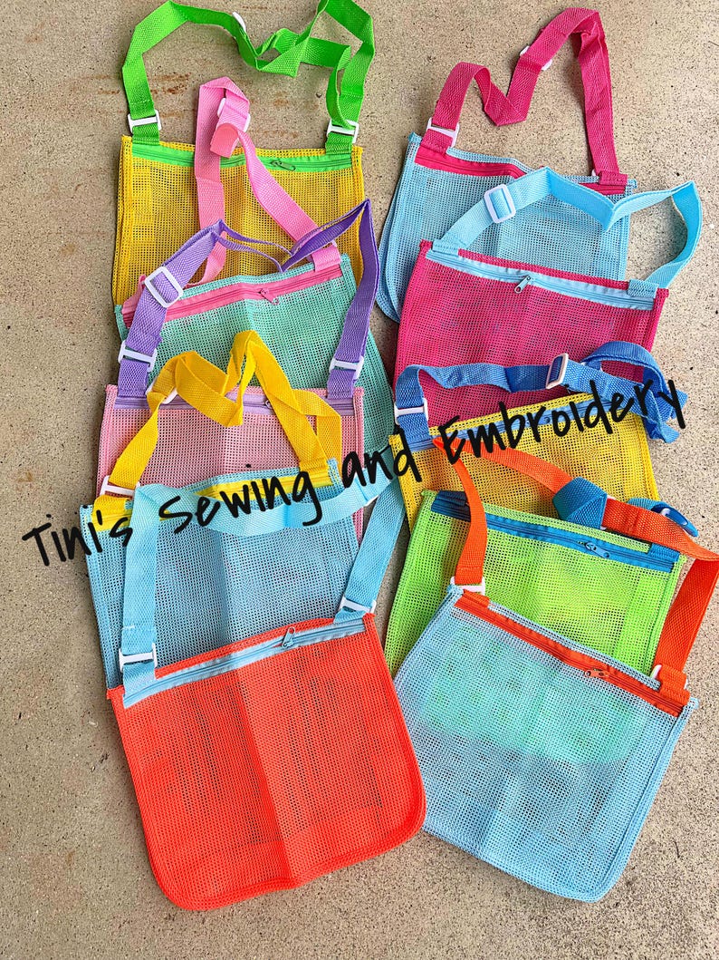 May include: Assortment of colourful mesh bags with zippered pockets and adjustable straps. The bags are made of a fine mesh material and are perfect for carrying small items.