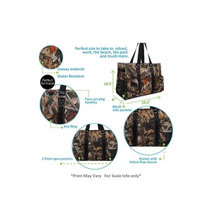 May include: A large, camouflage-patterned tote bag with two carrying handles, a key ring, two front open pockets, and a pocket with a Velcro flap closure. The bag measures 10.5 inches tall, 15.5 inches wide, and 6 inches deep. The bag is made of water-resistant canvas material.