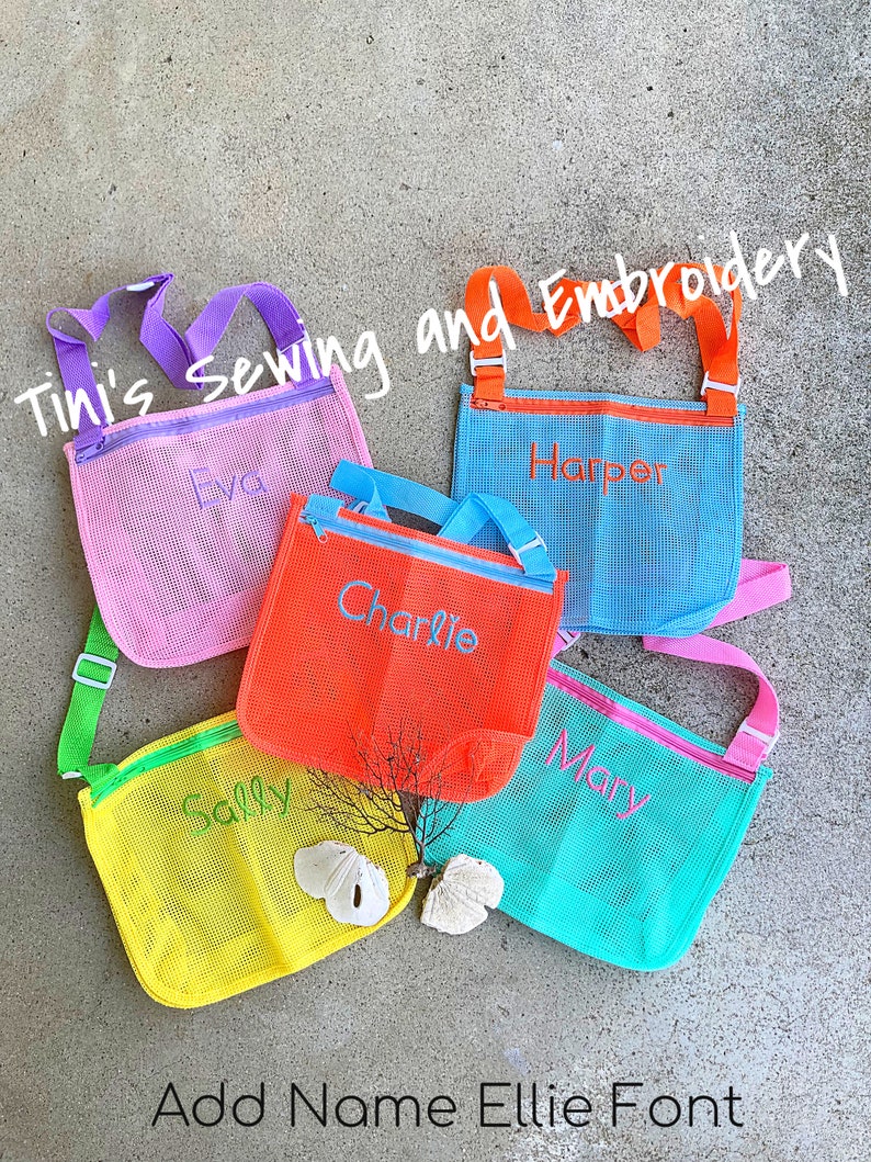 May include: Five colourful mesh bags with adjustable straps and zipper closures. Each bag has a name embroidered on it: Eva, Harper, Charlie, Sally, and Mary. The text "Tini's Sewing and Embroidery" is written across the top of the image. The text "Add Name Ellie Font" is written at the bottom of the image.