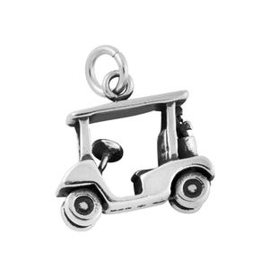 May include: A silver-colored golf cart charm with a detailed design. The charm features a small steering wheel, two seats, and two wheels. The golf cart has a roof and is attached to a jump ring.
