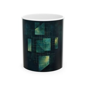 May include: A white ceramic mug featuring a dark teal and navy blue background with a series of overlapping translucent geometric rectangles and thin, interconnected light-colored lines that create a complex, grid-like network pattern across the surface.