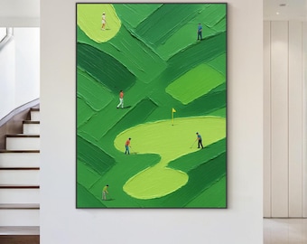 May include: An abstract oil painting depicting a golf course with several golfers. The artwork features a textured, green landscape with golfers in various positions. A yellow flag marks a hole on the green. The painting is framed in black.