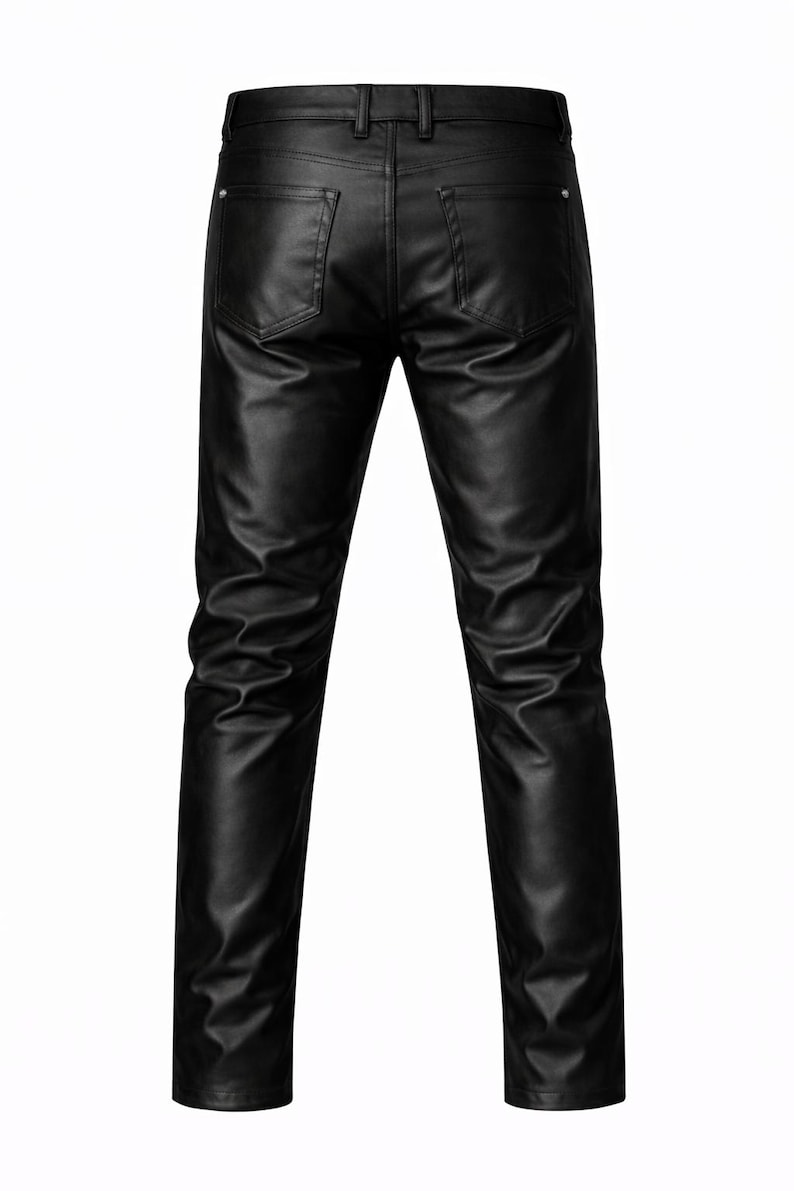 May include: Black leather pants with a classic five-pocket design. The pants have a straight leg cut and a shiny finish. The back view shows the pockets and belt loops. A stylish and edgy addition to any wardrobe.