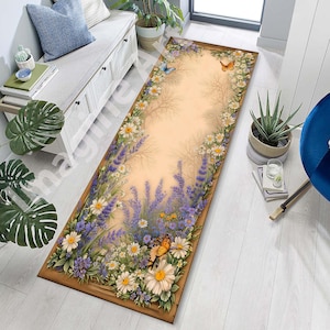 May include: A rectangular floral rug featuring a light brown background with a border of daisies, lavender, and butterflies. The rug has a wooden frame design and is placed on a light-colored wooden floor.