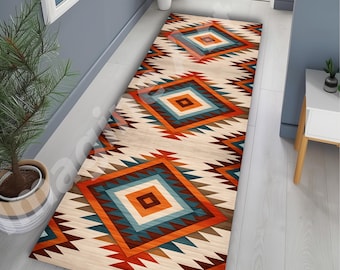 May include: A long rectangular runner rug featuring a repeating geometric pattern of diamonds and zigzags in shades of orange, teal, brown, and cream. The design is symmetrical, with large central diamond shapes connected by smaller angular motifs.