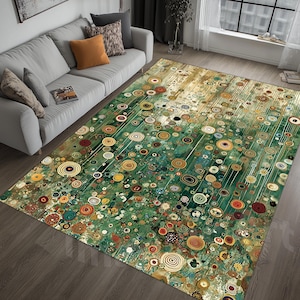 May include: A rectangular area rug with an abstract design featuring a green and gold color palette. The rug has a pattern of circles and lines, creating a modern and artistic look. The rug is placed on a wooden floor.