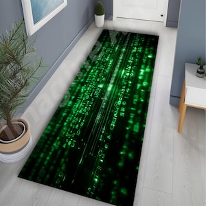 May include: A rectangular green and black rug with a digital rain pattern. The rug features a matrix-style design with glowing green characters and symbols, creating a tech-inspired aesthetic. The rug is placed in a hallway.