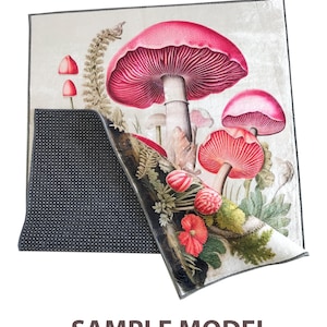 May include: A rectangular rug with a botanical illustration of pink mushrooms, ferns, and red flowers. The rug has a cream-colored background and a dark gray border. The text "SAMPLE MODEL" is printed at the bottom.