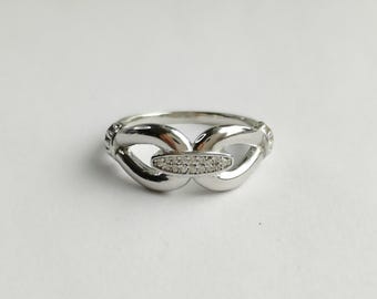 Anillo de plata de ley con nudo infinito de amor y circonitas cúbicas, talla 7 / Anillo de promesa de amistad con circonitas cúbicas / Regalo simbólico para ella
