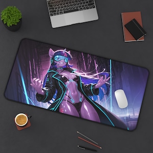 May include: A rectangular black desk mat with a digital art illustration of a purple character with a futuristic design. The character is set against a backdrop of neon lights and a cityscape. A white mouse is on the right.