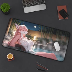 May include: A rectangular mousepad featuring a digital illustration of a pink-furred anthropomorphic fox relaxing in a hot spring. The scene includes bamboo, a full moon, and a night sky. A white mouse is on the right.