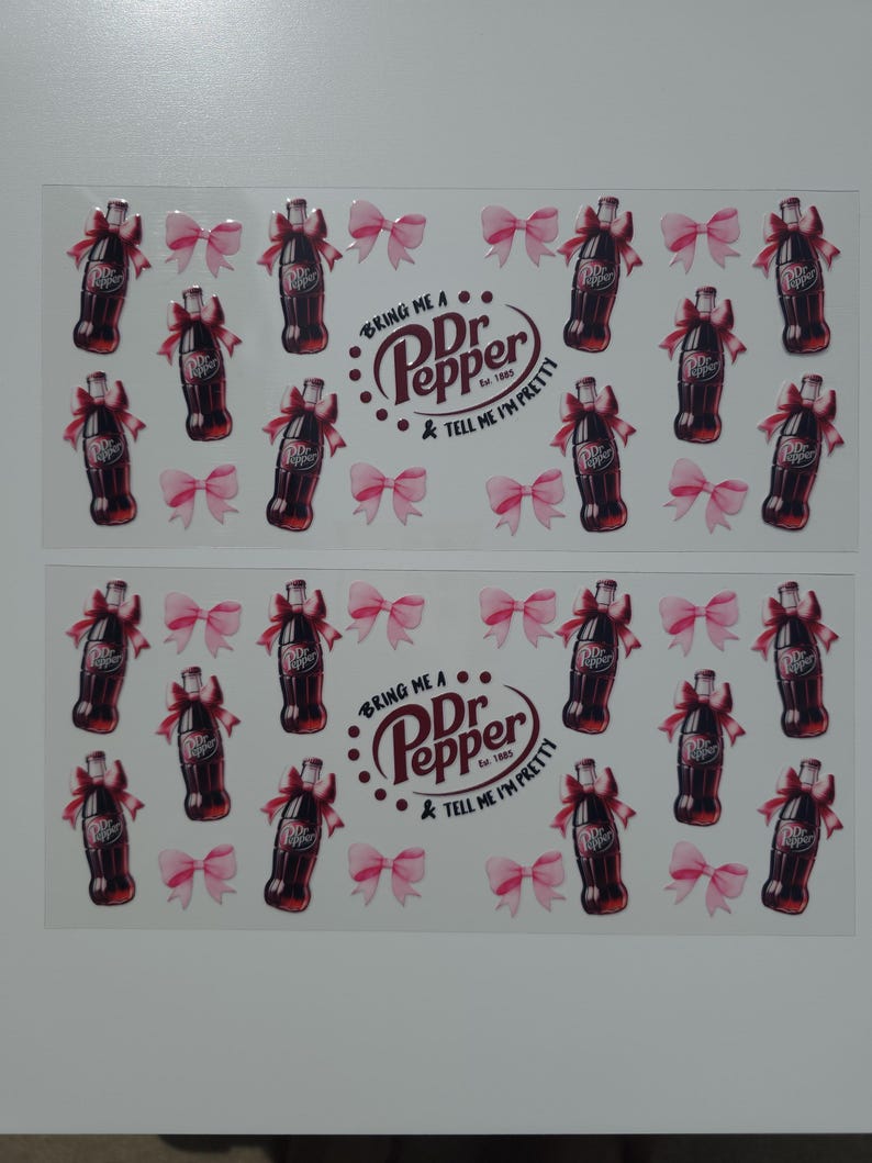 May include: Sheet of stickers featuring Dr. Pepper bottles with red bows and pink bows. The text "BRING ME A Dr. Pepper & TELL ME I'M PRETTY" is also included. The stickers are arranged in a grid pattern.