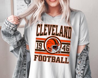 ヴィンテージ クリーブランド フットボールファンシャツ、レトロ バーシティTシャツ、パーカー