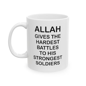 May include: White ceramic coffee mug with black text that reads "ALLAH GIVES THE HARDEST BATTLES TO HIS STRONGEST SOLDIERS".