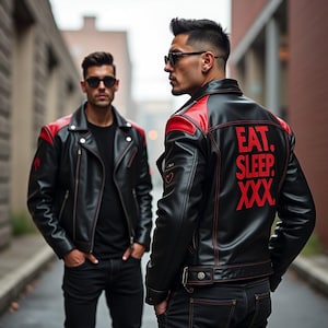 May include: Two black leather jackets with red accents are worn by two people in an urban setting. The jackets have red shoulder panels and red stitching. One jacket has the text "EAT. SLEEP. XXX" on the back.