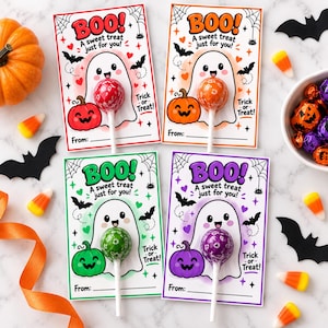 May include: Four rectangular Halloween cards featuring a white ghost, a jack-o'-lantern, and the text "BOO! A sweet treat just for you!" and "Trick-or-Treat!". Each card holds a round lollipop in red, orange, green, or purple, matching the card's accent colors.