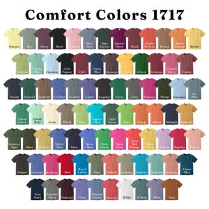 May include: A color chart of Comfort Colors 1717 t-shirts, showcasing a wide array of hues. The image displays a grid of shirts in various shades, including Banana, Black, and Navy. The text "Comfort Colors 1717" is at the top.