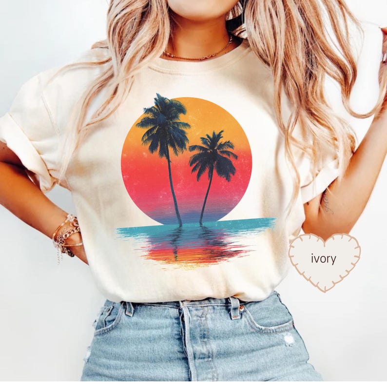 a woman wearing a t - shirt with a palm tree on it