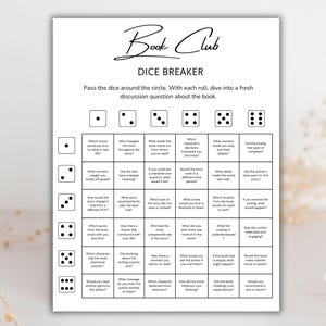 May include: A black and white Book Club Dice Breaker game. The game features dice with discussion questions. The text reads "Book Club" and "Dice Breaker". The game is designed to spark conversation about books.