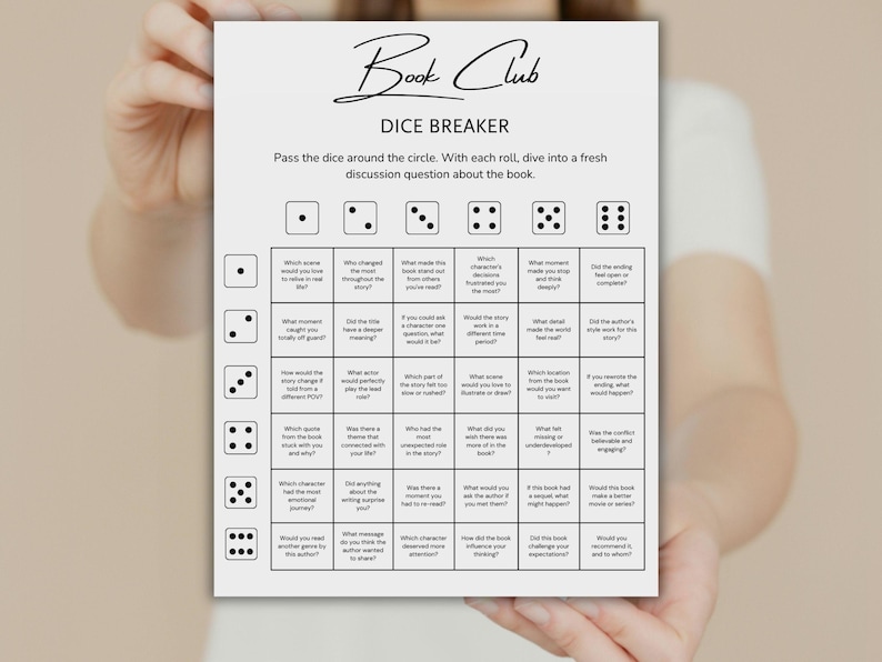 May include: A white Book Club Dice Breaker game sheet with discussion questions. The sheet features dice icons and prompts like "Which scene would you love to relive in real life?" and "Did the ending feel open or complete?"