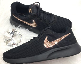 black nikes with rose gold swoosh