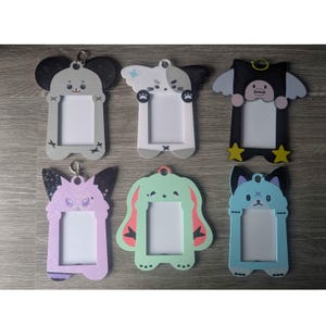 Xdinary Heroes Holographic Xdinary Monster Photocard Holder - Toploader Safe & Portable Bias Display!