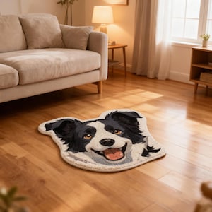 May include: A dog-shaped rug with a smiling face, featuring black and white fur and brown eyes. The rug is placed on a hardwood floor in a living room setting. The rug's design resembles a Border Collie.