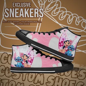 May include: Pink and black high-top sneakers with a graphic print of Stitch and Lilo from the Disney movie Lilo & Stitch. The sneakers have a white rubber sole and a black toe cap. The text "EXCLUSIVE SNEAKERS" is at the top of the image. The text "NOT JUST SHOES - YOUR PERSONALITY, CUSTOM-MADE" is below the sneakers.