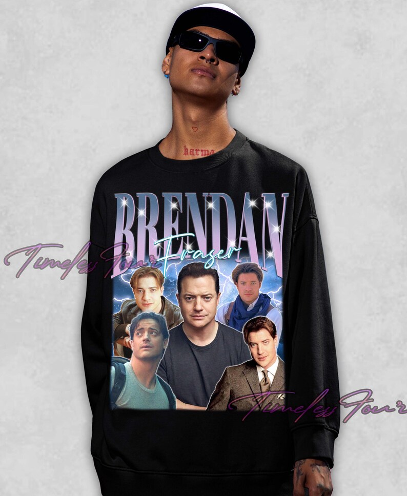 May include: Black sweatshirt featuring a collage of images of Brendan Fraser, with the name "Brendan Fraser" in a stylized font. The design includes lightning bolt graphics and a vintage aesthetic, perfect for fans.