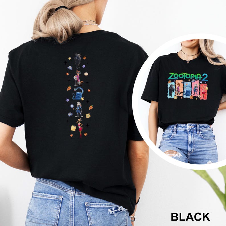 May include: Black t-shirt featuring a colorful graphic of characters from Zootopia 2 on the front and a vertical design on the back. The front graphic includes the text "Zootopia 2". The back design features cartoon characters and other elements.