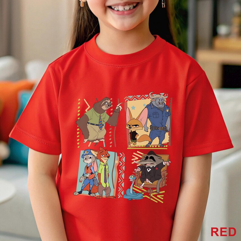 May include: A red t-shirt with a colourful graphic of characters from the animated film "Zootropolis". The design includes images of a sloth, fox, police officer, and other characters. The word "RED" is printed in the bottom right corner.
