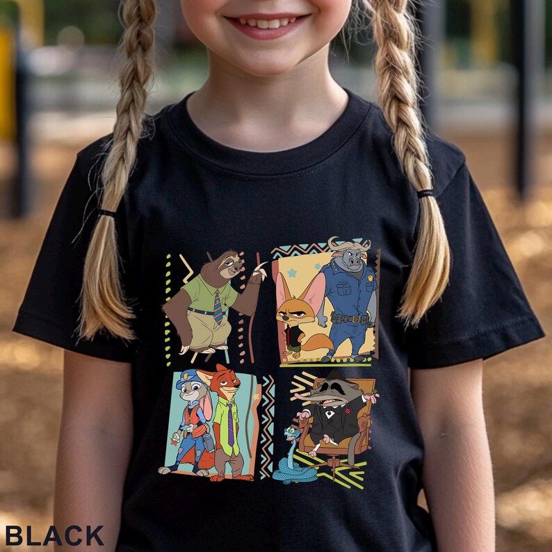 May include: Black t-shirt with a vibrant cartoon design of characters from an animated film. The graphic includes a sloth, fox, buffalo, rabbit, and raccoon. The word "BLACK" is printed at the bottom of the shirt.