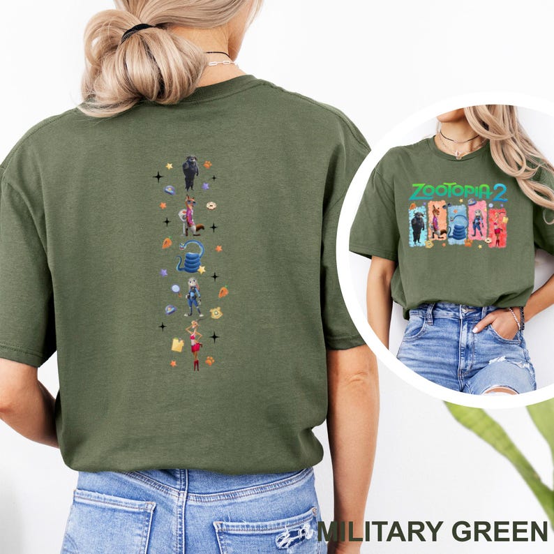 May include: Military green t-shirt featuring a colorful graphic of characters from Zootopia 2 on the front and back. The back design is a vertical arrangement of cartoon characters and icons. The front of the shirt has the text "Zootopia 2".