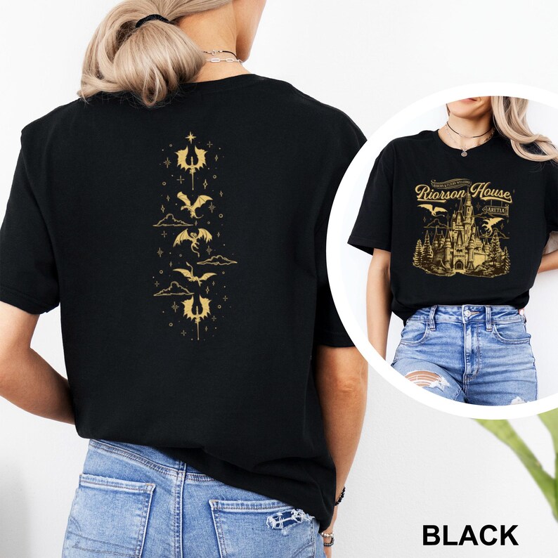 May include: Black t-shirt featuring a gold dragon design on the back and a gold castle graphic on the front. The front graphic includes the text "Riorrson House" and "Arctica". The shirt is made of a soft material.