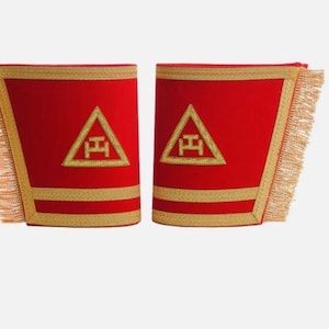 May include: A pair of red Masonic arm bands with gold trim and a gold embroidered triangle with the letter 'H' inside.