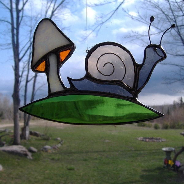 snail and mushroom stained glass suncatcher