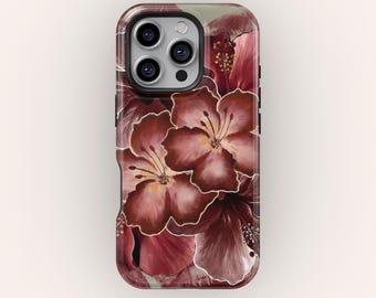 May include: A phone case featuring a floral design with maroon and gold hibiscus flowers. The case has a glossy finish and a dark border. The flowers have detailed petals and yellow stamens, set against a soft green background.